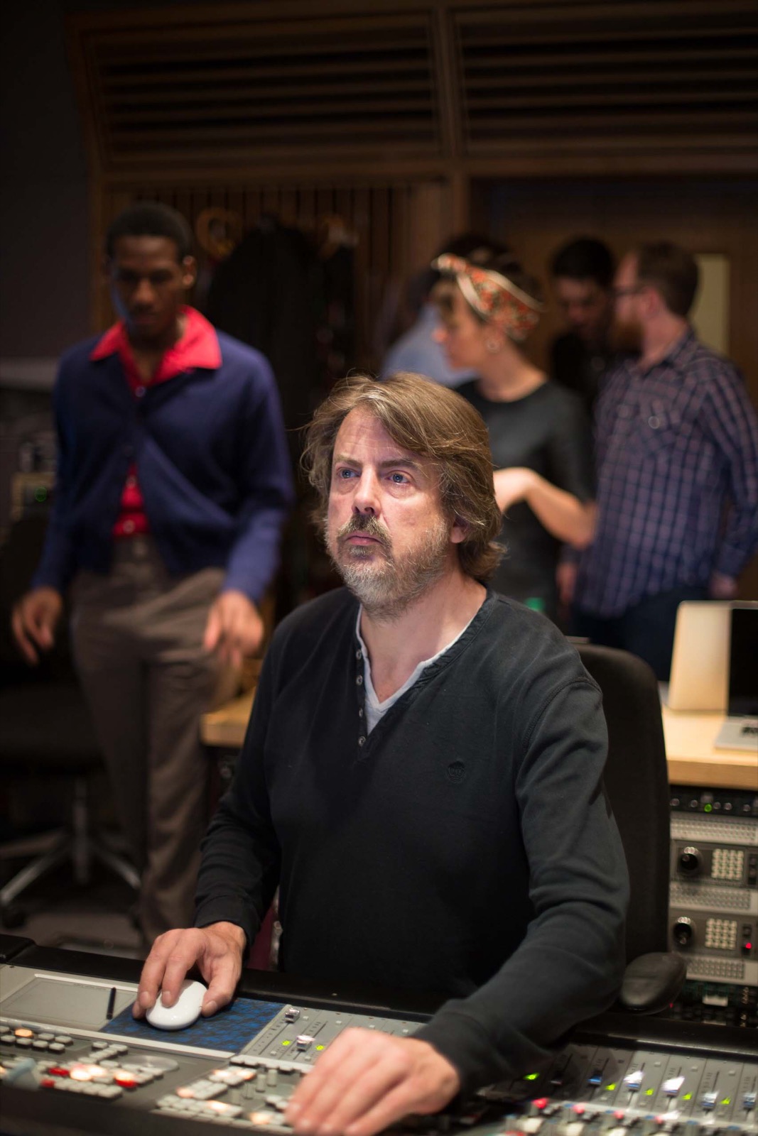 Simon Askew working at a mixing desk